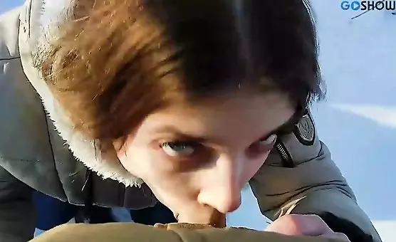 Wild winter loving couple indulges in passionate oral sex under icy skies